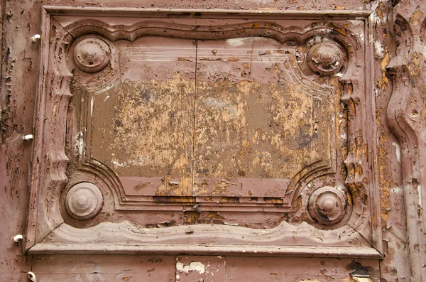 Ancient wooden door fragment. — Stock Photo, Image