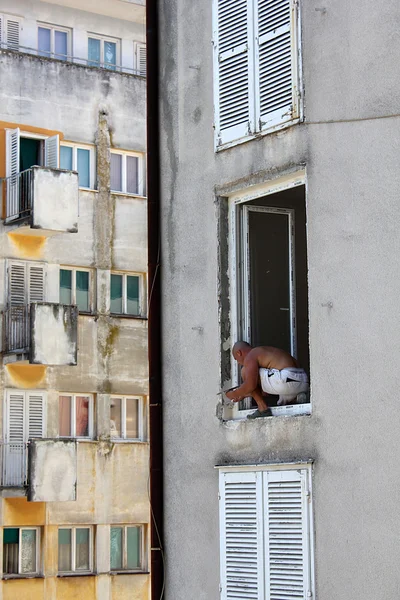 stock image Construction worker in the window