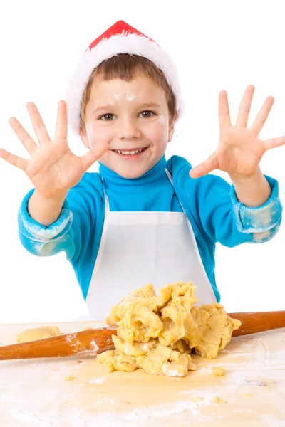 微笑的小男孩与烹饪圣诞节大餐 — 图库照片
