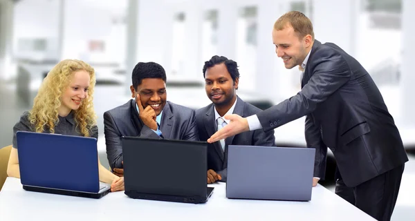 A business team of three planning work in office — Stock Photo, Image