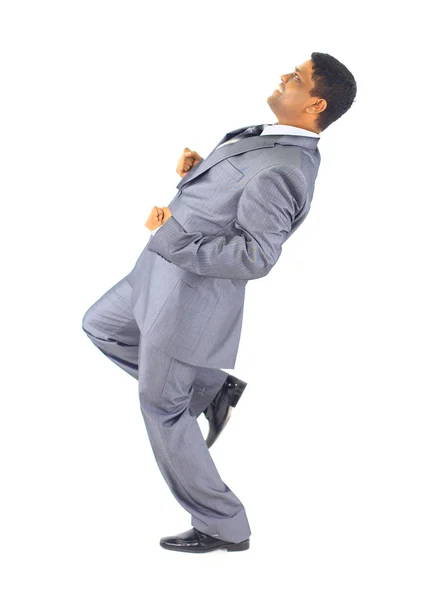 Бизнесмен поднимается по карьерной лестнице. Изолированный на белом фоне — стоковое фото