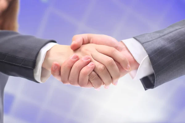 Handshake podnikatelů. na modrém pozadí. — Stock fotografie