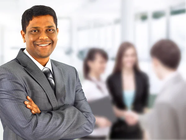 A happy black business man with in the background — Stock Photo, Image
