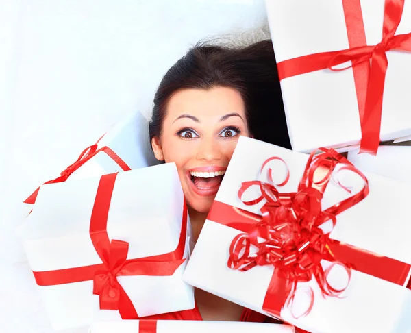 Young happy woman with a gift — Stock Photo, Image