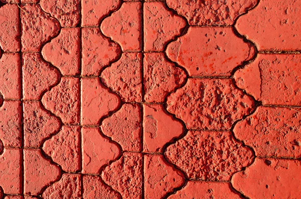 Pavimento pintado fundo vermelho — Fotografia de Stock