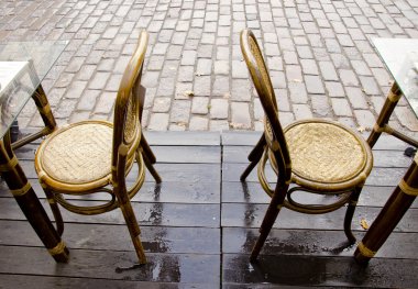 Two chairs in the street clipart