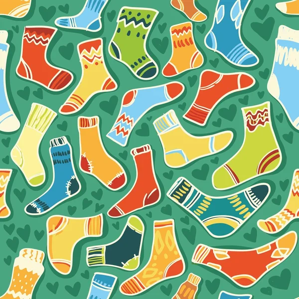 Seamless texture - bright baby socks with a green background — Stock Vector
