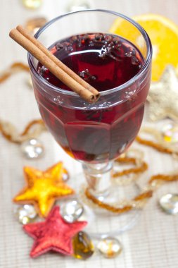 Mulled wine with cinnamon bark clipart