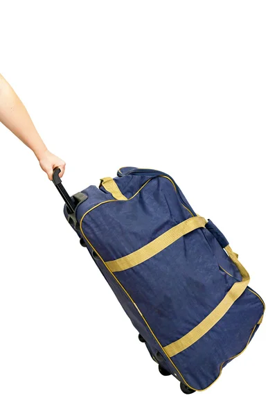 Синьою скатертиною чемодан — стокове фото