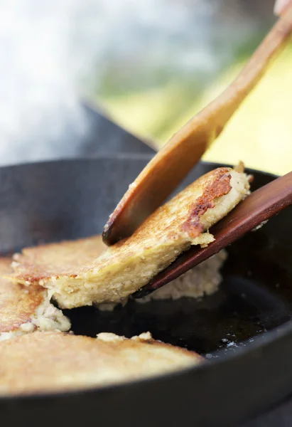 Potato pancakes frying process — Stock Photo, Image