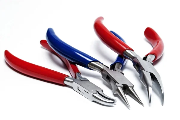 Pliers with handles of different colors — Stock Photo, Image