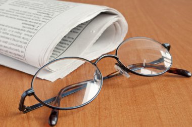 Glasses and Newspaper clipart