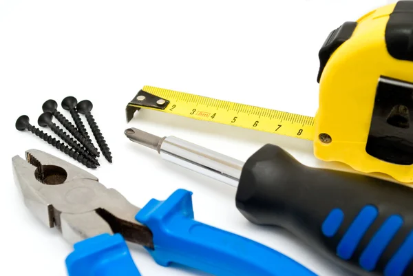 Screwdriver and pliers — Stock Photo, Image