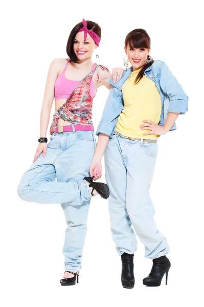 Two smiley girls in jeans — Stock Photo, Image