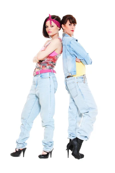 Portrait of two girls in jeans — Stock Photo, Image