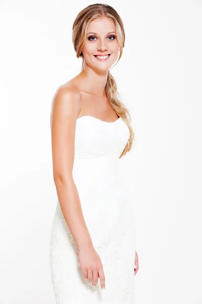 Beautiful smiley bride in white dress — Stock Photo, Image