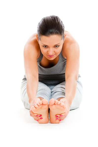 Mujer bonita haciendo ejercicio de flexibilidad —  Fotos de Stock