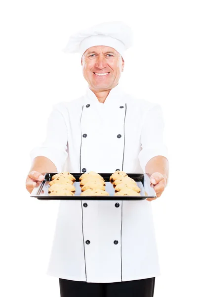 Smiley cook with cookies — Stock Photo, Image