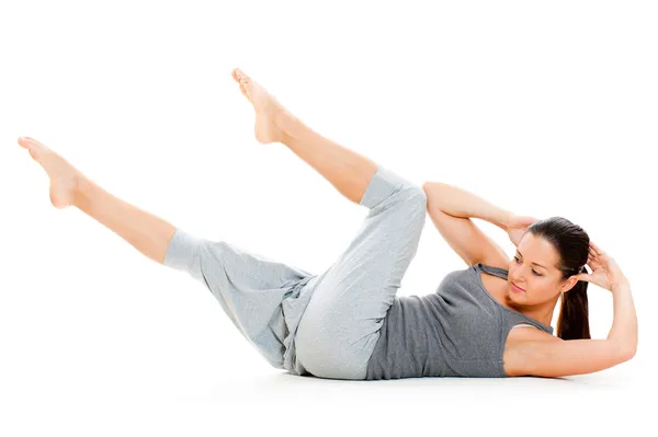 Woman doing exercises for abdominal muscles — Stock Photo, Image