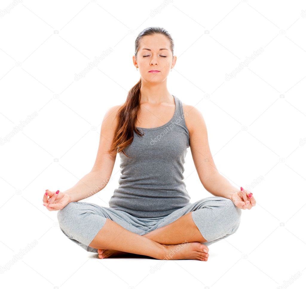 Pretty woman doing yoga exercise