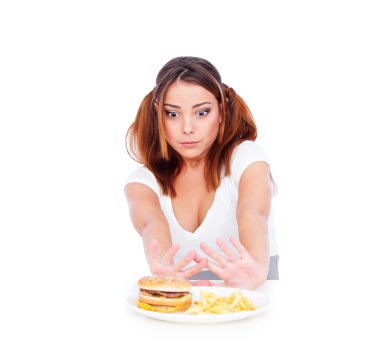 Young woman don't want to eat junk food clipart