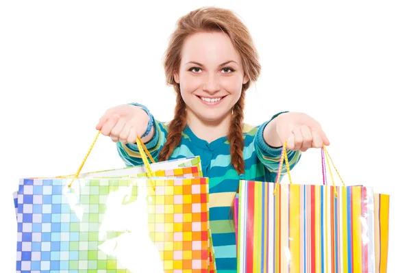 Gelukkig mooie vrouw met shopping tassen — Stockfoto