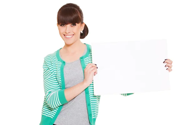 Smiley woman holding empty blank — Stock Photo, Image