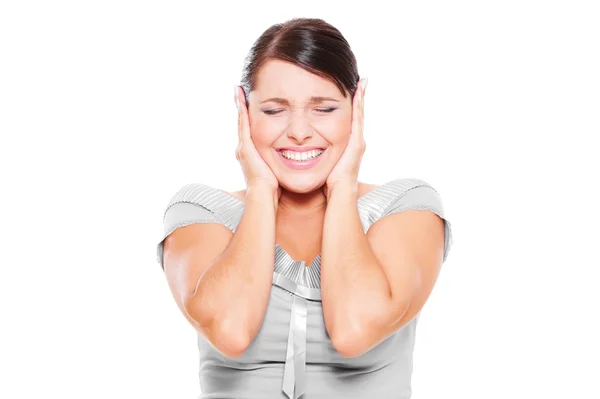 Stresující žena pokrývající její uši — Stock fotografie