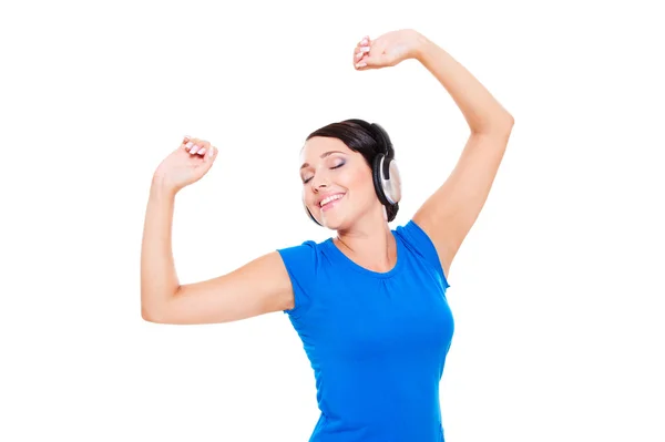 Woman in headphones is dancing — Stock Photo, Image