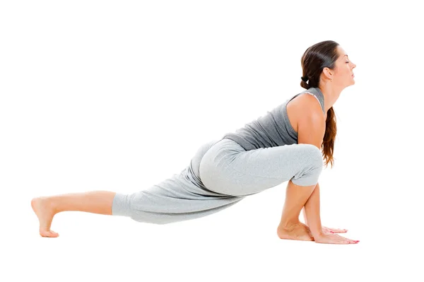 Giovane donna che fa esercizio di flessibilità — Foto Stock