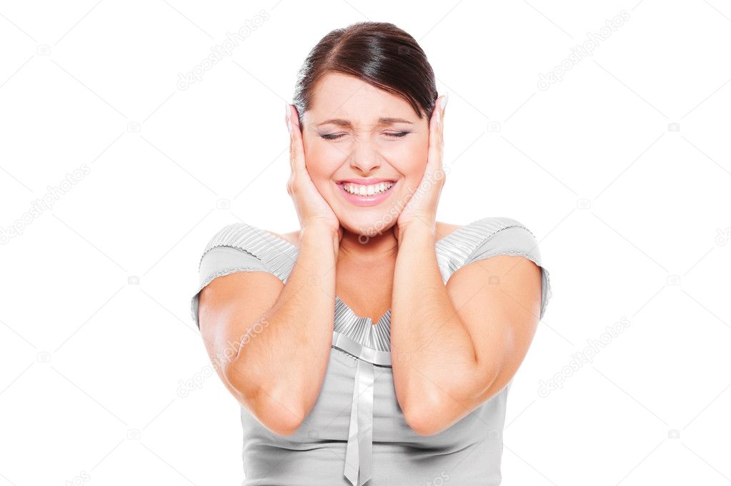 Stressful woman covering her ears