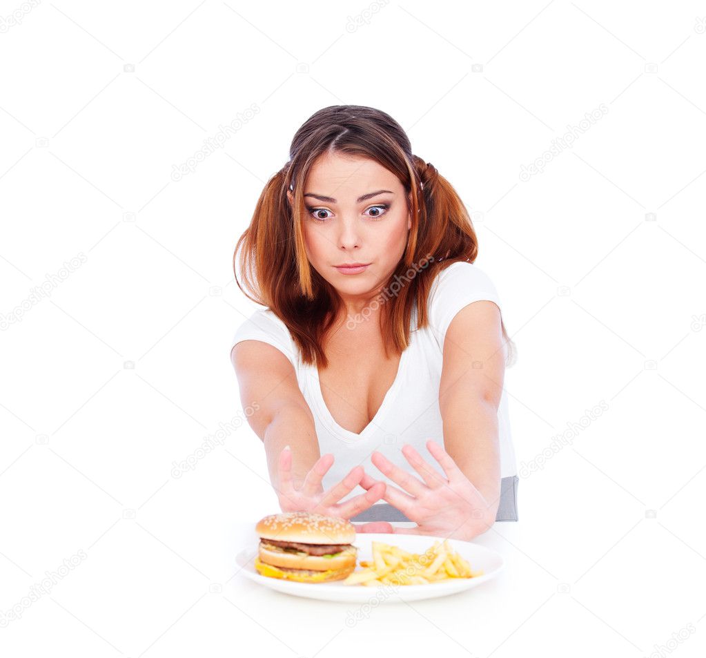 Young woman don't want to eat junk food