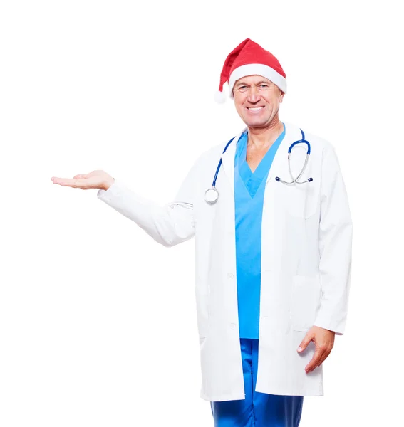Arzt mit roter Mütze hält etwas auf der Handfläche — Stockfoto