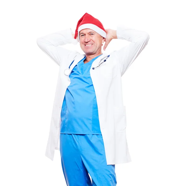 Šťastný lékař v červeném klobouku xmas — Stock fotografie