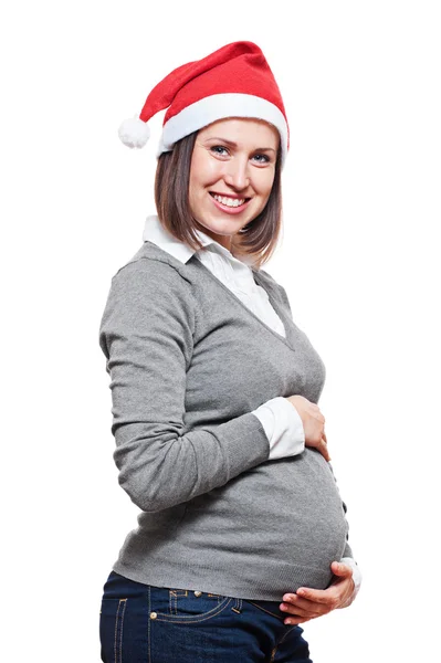 Feliz mulher grávida em santa chapéu — Fotografia de Stock