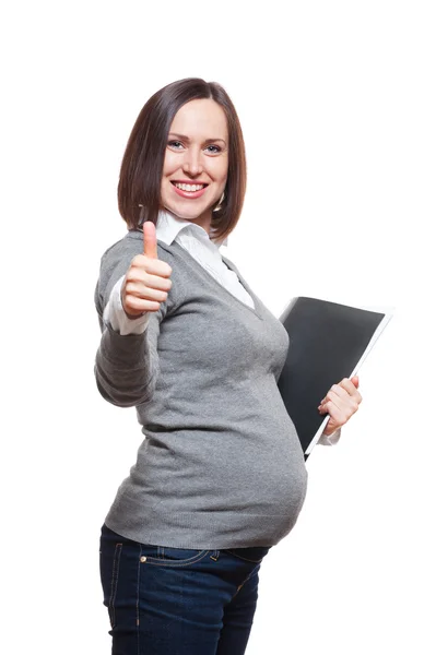 Pregnant woman at work showing thumbs up — Stock Photo, Image