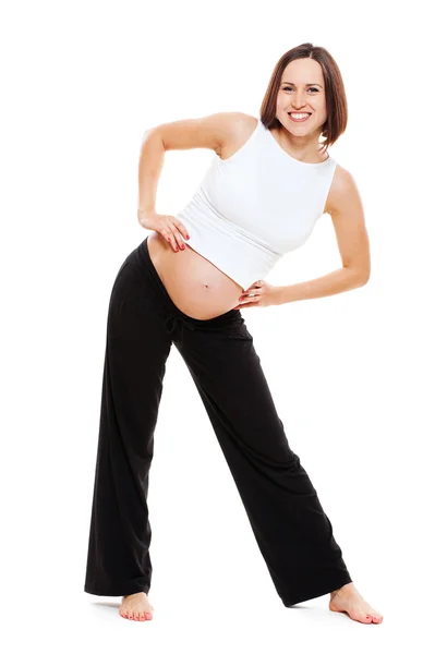 Gravid kvinna gör övning — Stockfoto