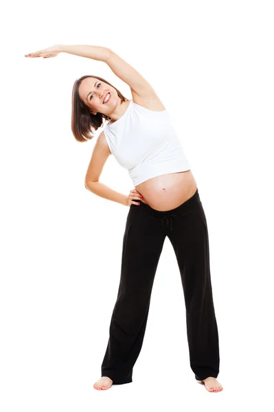 Mulher grávida fazendo ginástica — Fotografia de Stock