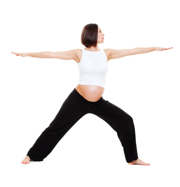 Mujer embarazada haciendo ejercicios de yoga — Foto de Stock