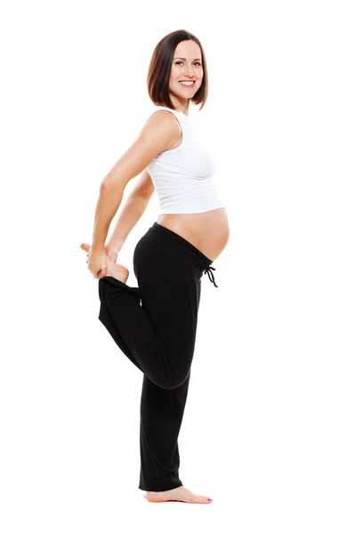 Sport w ciąży kobieta robi ćwiczenia rozciągające — Zdjęcie stockowe