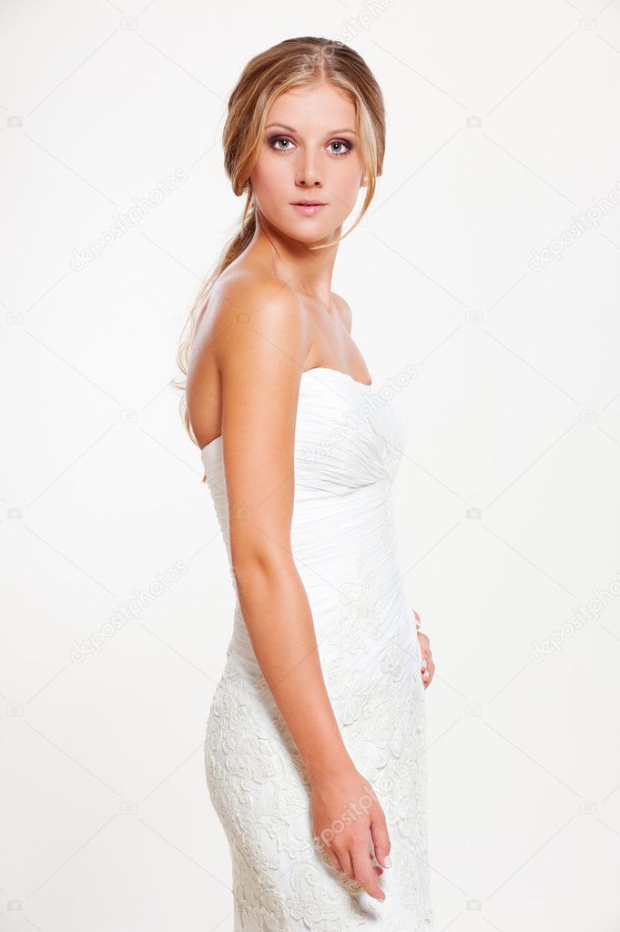 Bride in white dress posing