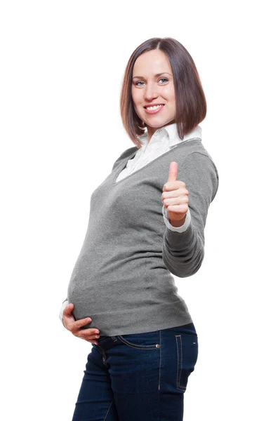 Schwangere im Pullover zeigt Daumen hoch — Stockfoto