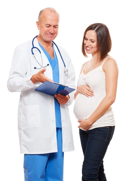 Těhotná žena a lékař vedou konverzaci — Stock fotografie