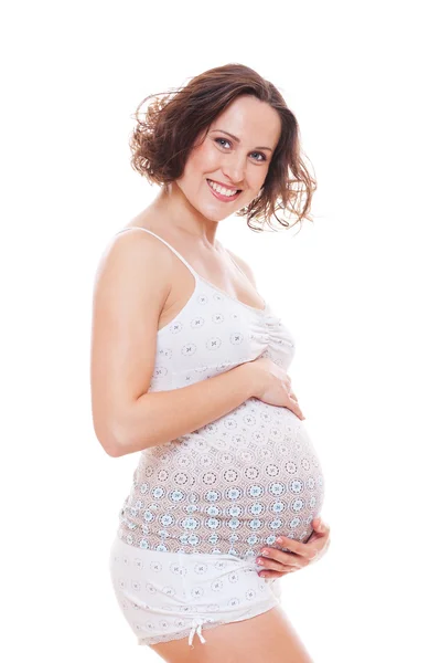 Glad gravid kvinna krama magen — Stockfoto