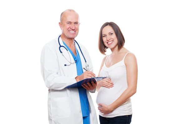 Gravid kvinna och läkare — Stockfoto