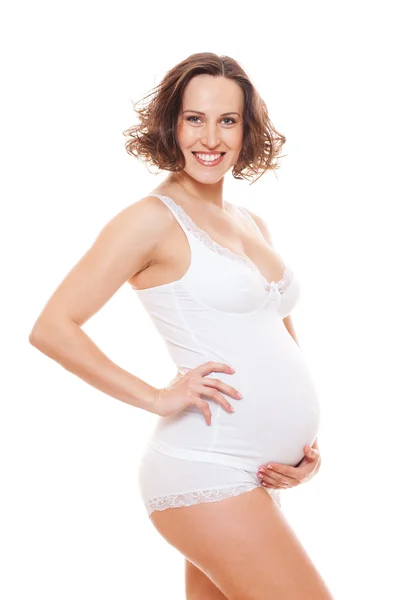 임신한 여자는 그녀의 배꼽 포옹 — 스톡 사진