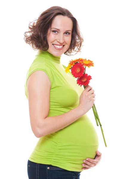 Mulher grávida com flores — Fotografia de Stock