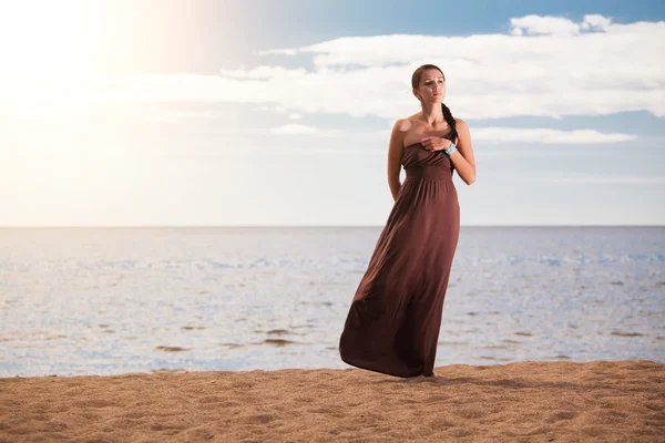 stock image Beautiful fashionable model on the beach