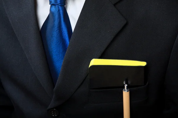 Podnikatel oblek a jeho notebook — Stock fotografie