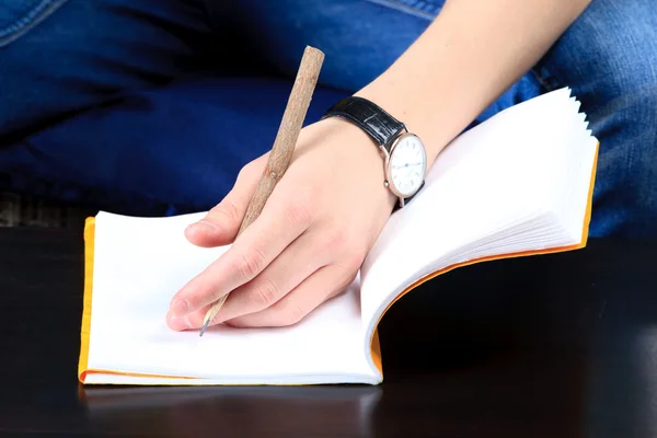Kéz- és jegyzetfüzet. közelről — Stock Fotó